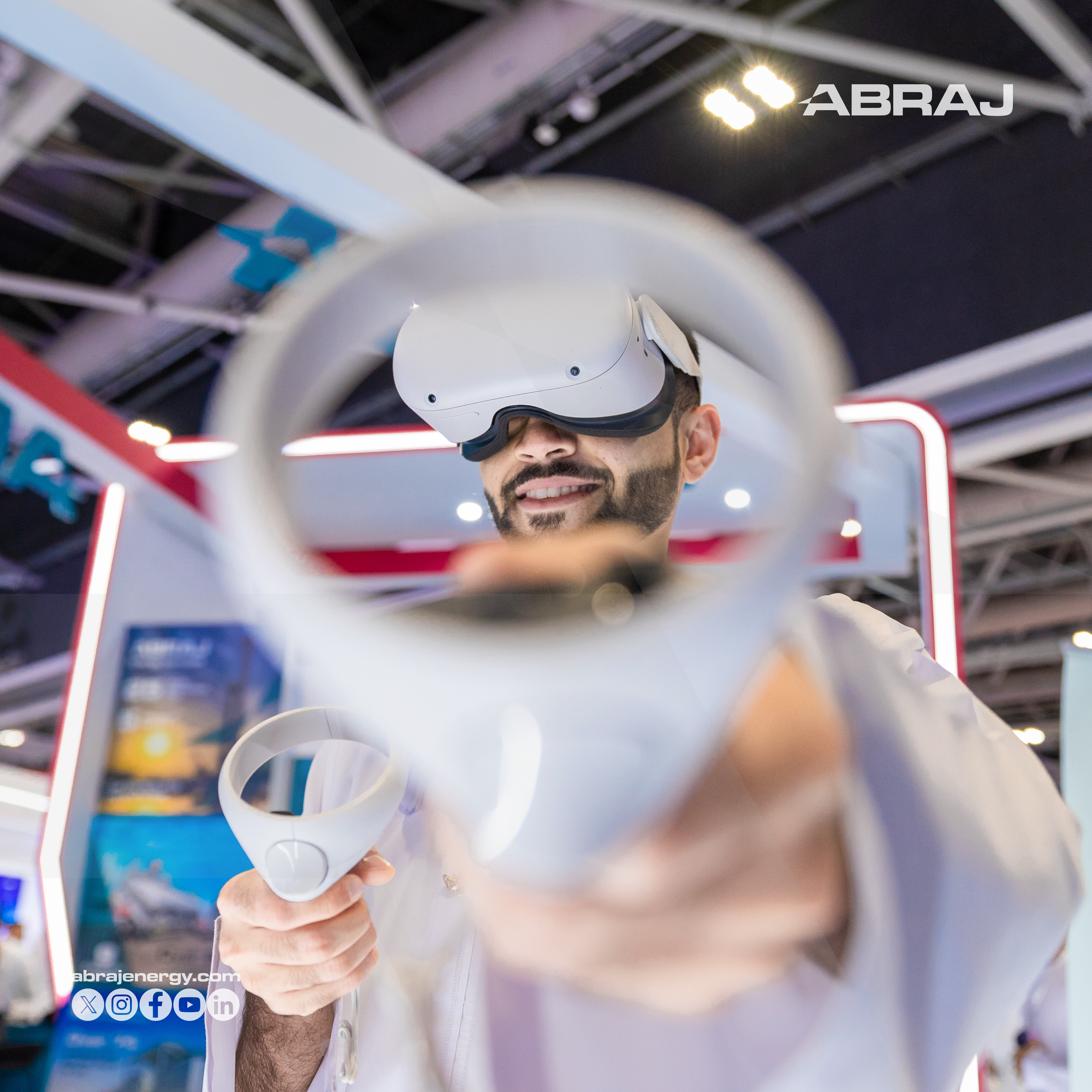Person using VR headset at Abraj exhibition